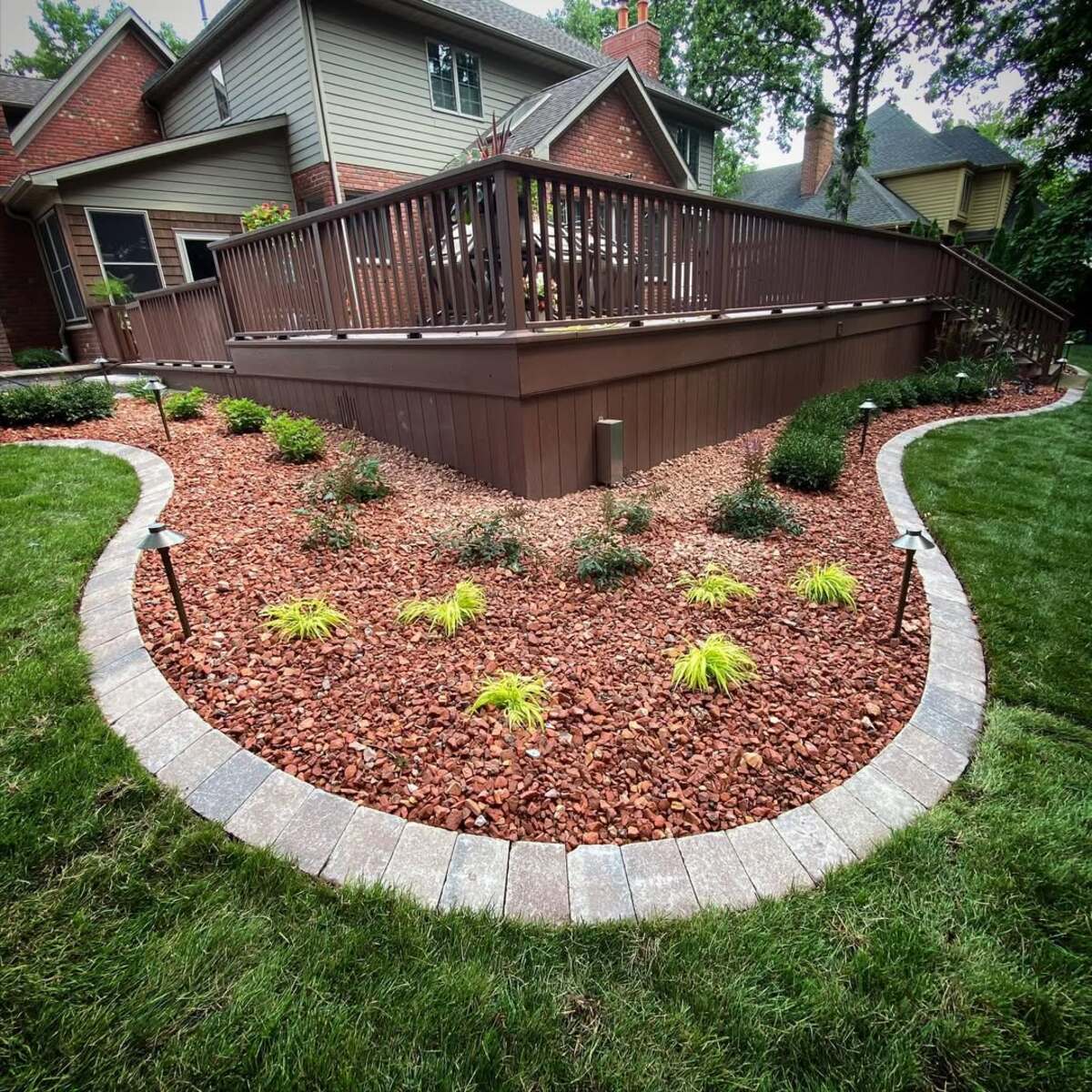 29 Brick Landscaping Ideas to Give Your Yard Timeless Charm 9 Red Rock Garden with Stone Trim