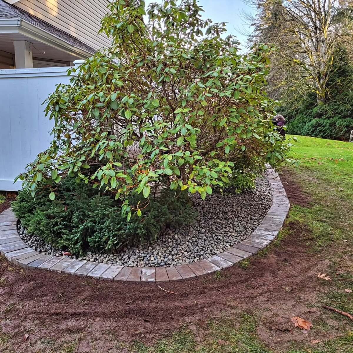 29 Brick Landscaping Ideas to Give Your Yard Timeless Charm 10 Circular Stone Tree Ring
