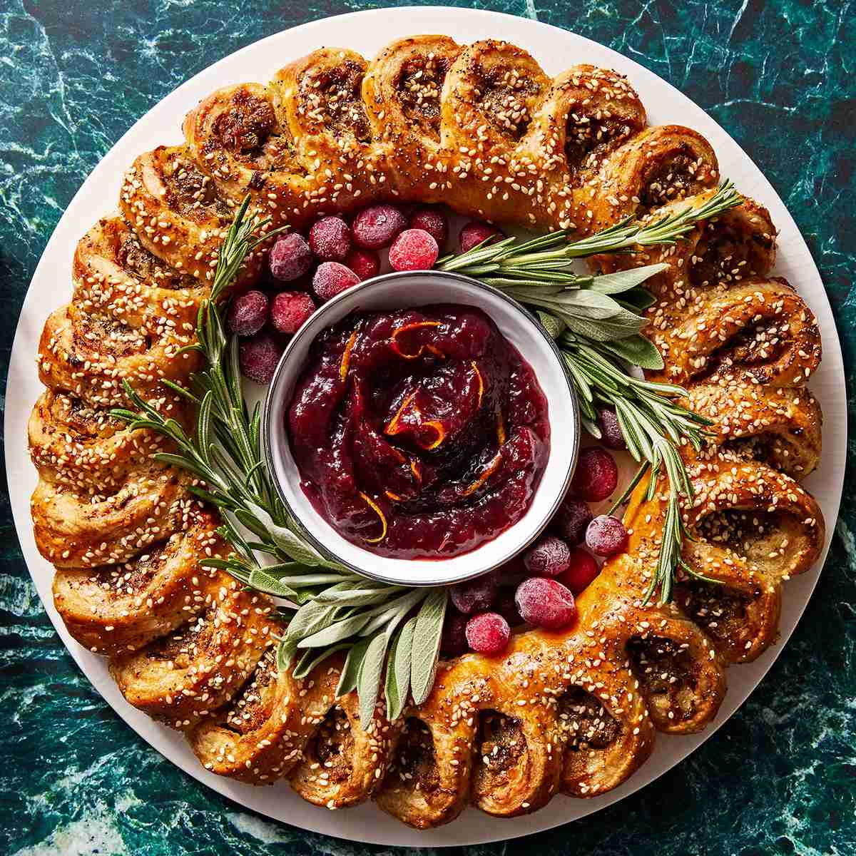 51+ Christmas Party Appetizers Everyone Will Want to Try 5 Cranberry Sausage Pinwheel Wreath