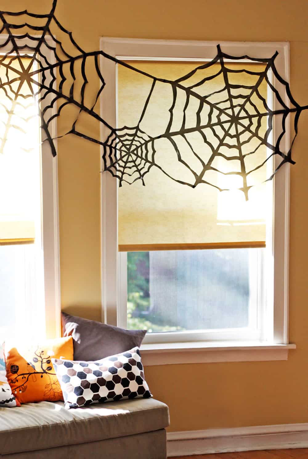 Paper Spiderweb Window Display