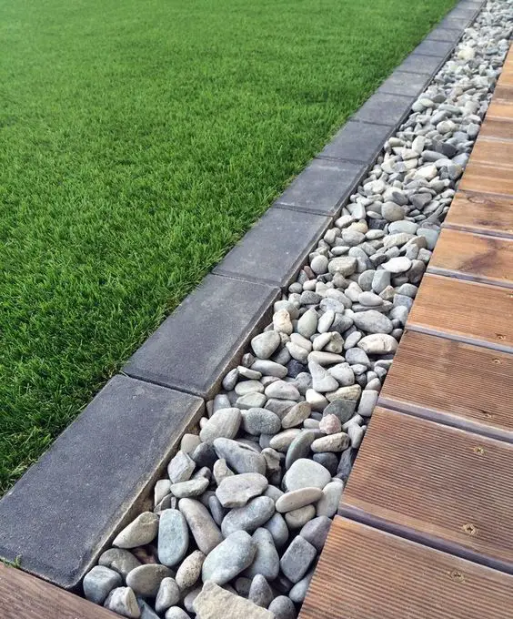 Pebble Drain and Paver Border