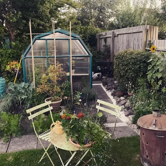 27 Kitchen Garden Ideas for a Beautiful and Productive Space 20 Backyard Greenhouse Garden Nook