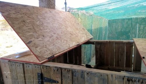 21 Pallet Chicken Coop Ideas for a Budget-Friendly Build 14 Hinged OSB Roof Nest Box