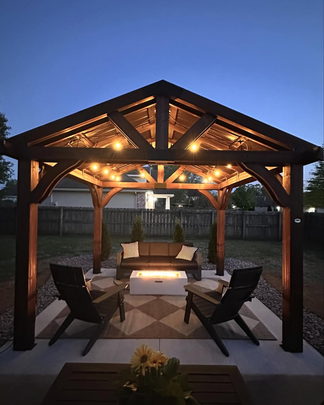 21 Covered Gazebo Ideas for a Beautiful and Cozy Outdoor Space 12 Illuminated A Frame Timber Shelter