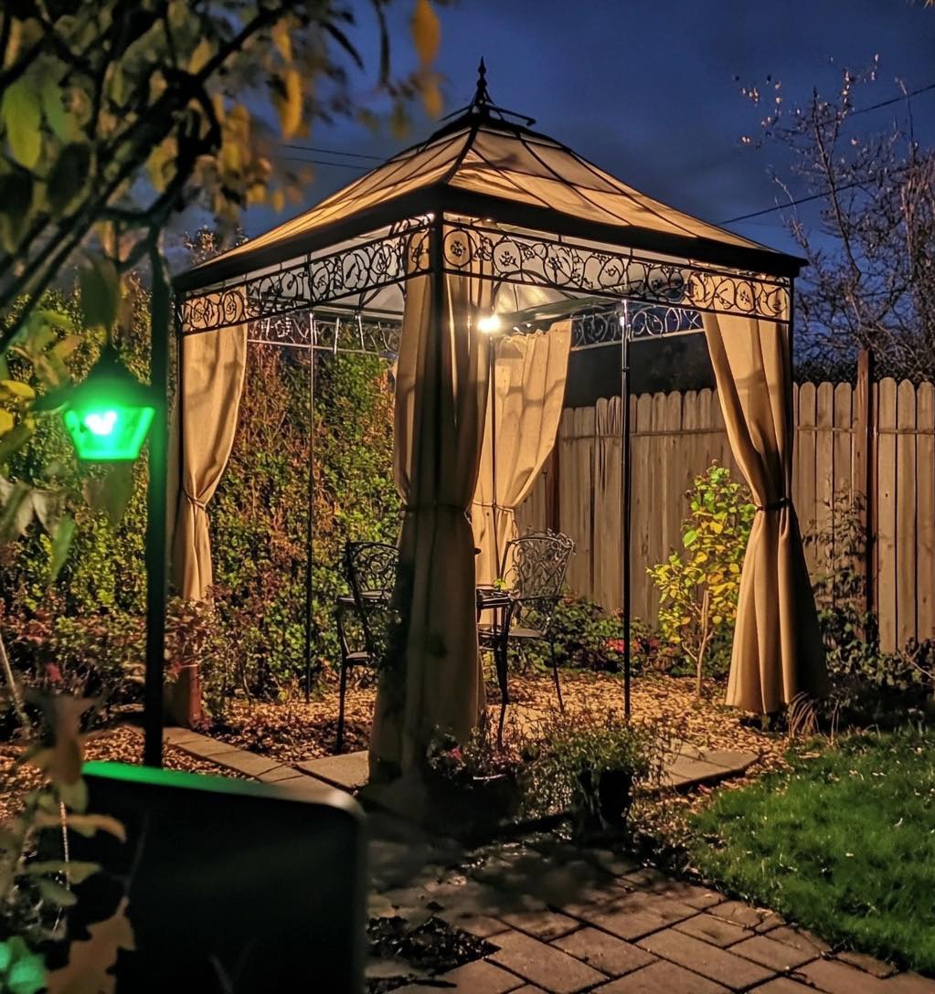 21 Covered Gazebo Ideas for a Beautiful and Cozy Outdoor Space 14 Ornate Iron Soft Top Gazebo