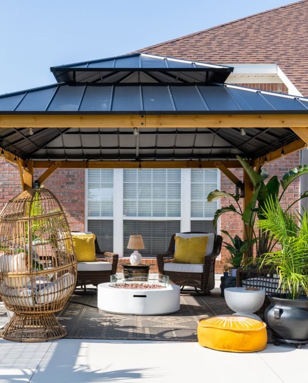 Tiered Metal Roof Pavilion with Tropical Decor