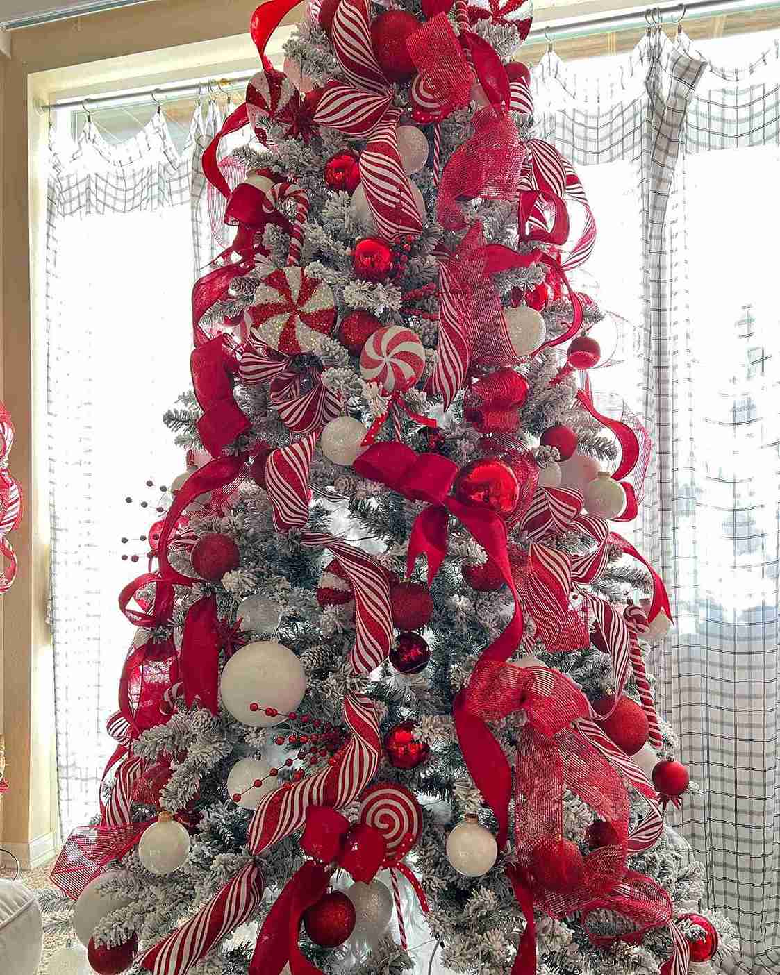 23+ Peppermint Christmas Tree Ideas for Sweet Holiday Decor 3 Red Ribbon Flocked Peppermint Tree