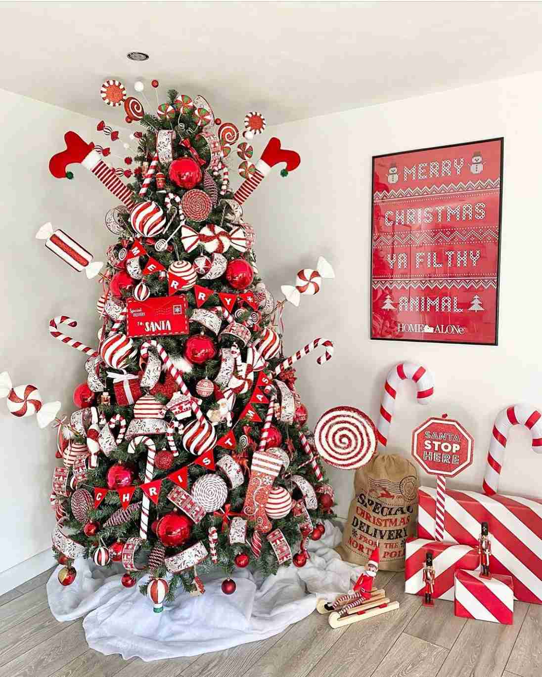 23+ Peppermint Christmas Tree Ideas for Sweet Holiday Decor 15 Playful Elf Leg Peppermint Tree