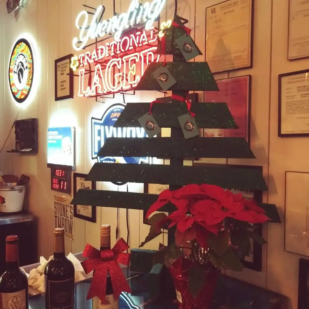 27+ Wood Christmas Trees DIY Ideas for Rustic and Creative Holiday Decor 9 Wall Mounted Bar Decor Slat Tree